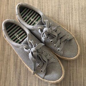 Gray Soda sneakers.